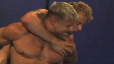 Two muscled buddies turn a wrestling match into a cocksucking session