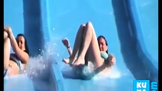 Tiny tits and ass exposed on the waterslide